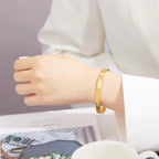 Elegant Clover Zircon Bangle – Gold Stainless Steel Bracelet for Women