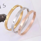 Elegant Clover Zircon Bangle – Gold Stainless Steel Bracelet for Women