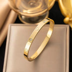 Elegant Clover Zircon Bangle – Gold Stainless Steel Bracelet for Women