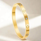 Elegant Clover Zircon Bangle – Gold Stainless Steel Bracelet for Women